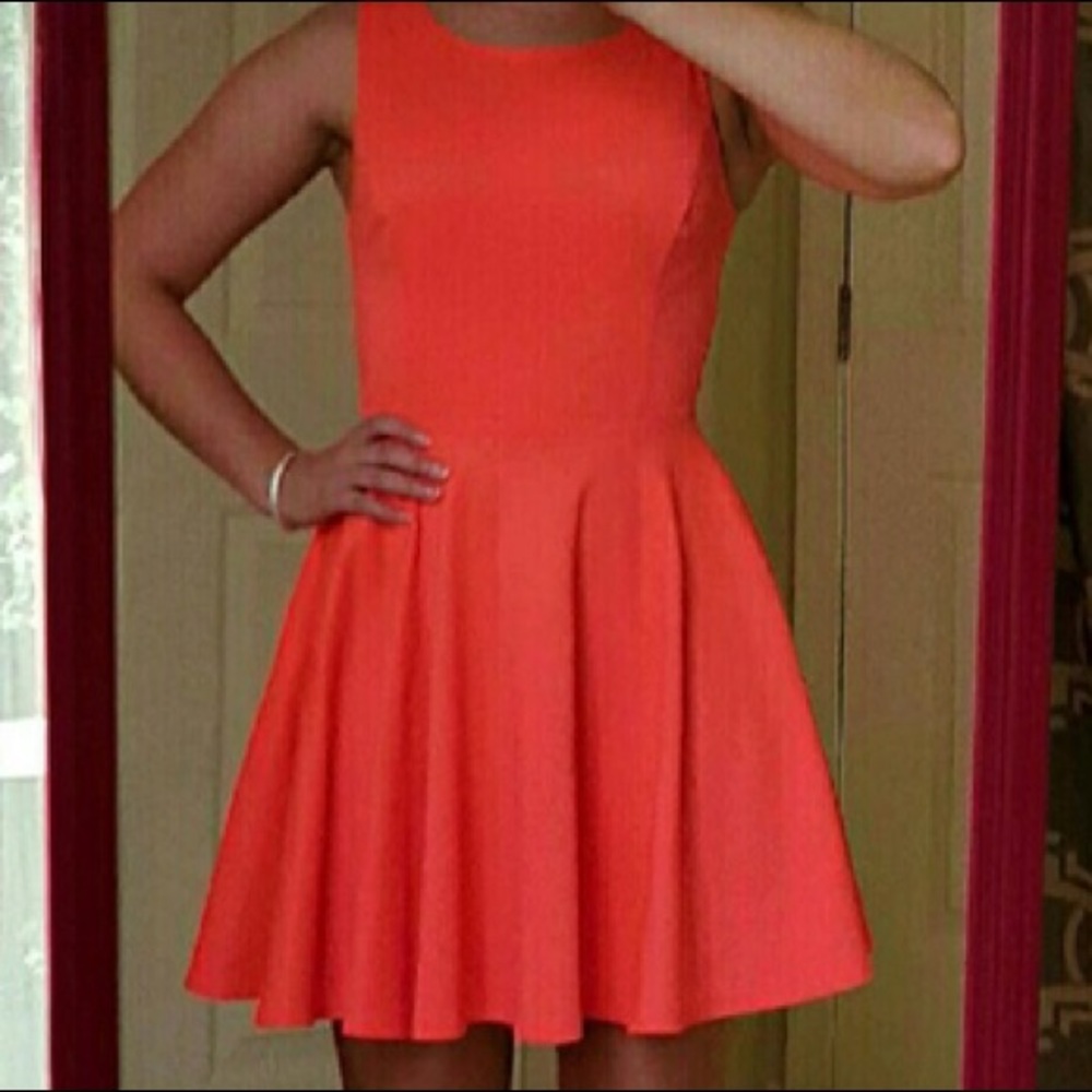 Neon orange cut outs dress